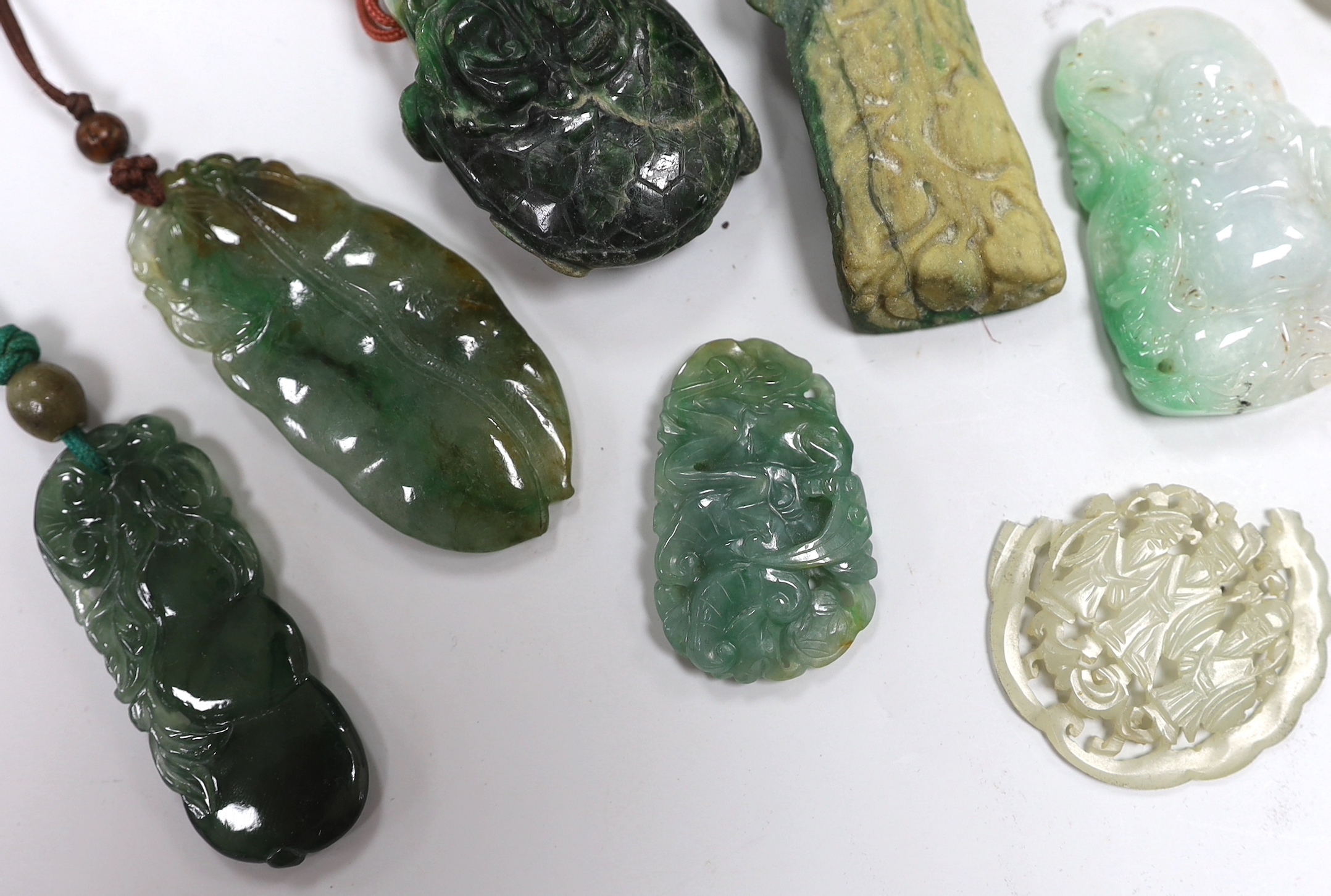 Thirteen Chinese jadeite and jade carvings, longest 6.4cm
